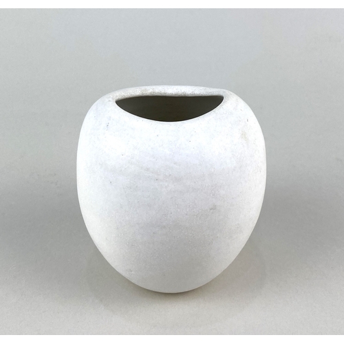 53 - Dame Lucie Rie (Austrian / British 1902-1995), a white glazed vase of pebble shaped form with invert... 