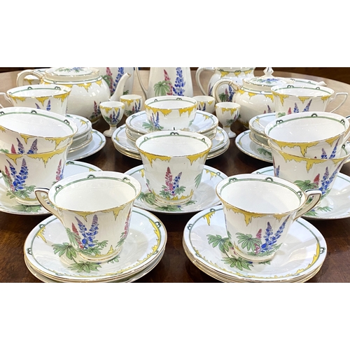 55 - An Addersley 'Lupin' pattern bone china part tea and dinner service exclusive to Harrods, to include... 