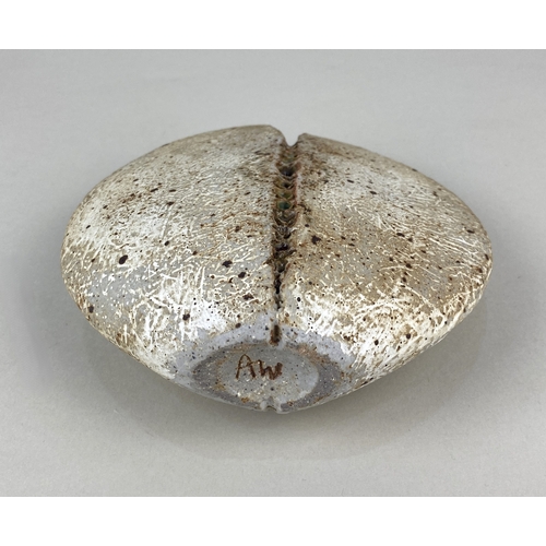 8 - Alan Wallwork (1931-2019), a studio pottery stoneware split seed pod, flattened oviform shape with t... 