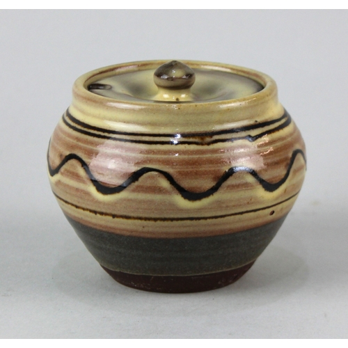 101 - A Charles Tustin for Winchcombe studio pottery condiment pot and cover, baluster form, with slip dec... 