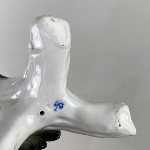 105 - A Karl Ens porcelain model of a woodpecker 24cm