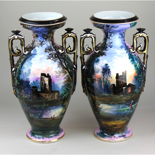 114 - A pair of large two-handled vases baluster shape decorated in shades of lilac and blue with woodland... 