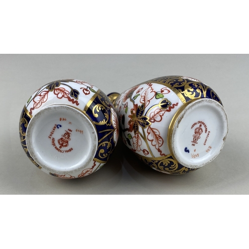 23 - A pair of Royal Crown Derby vases, c.1900, decorated in the Japan Imari palette, pattern 6299, 13cm ... 