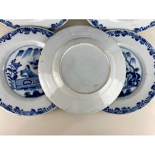 5 - A set of six Delft blue and white plates with Chinoiserie decoration of a figure in a garden 23cm di... 