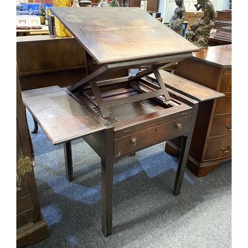 550 - An 18th century mahogany architects table, having a double hinged ratcheted top flanked on either si... 