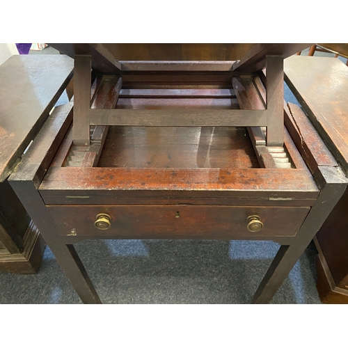 550 - An 18th century mahogany architects table, having a double hinged ratcheted top flanked on either si... 