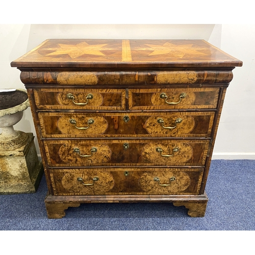 563 - A William and Mary figured and oyster veneered chest of three long and two short crossbanded drawers... 