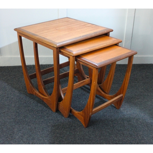 577 - A mid-20th century G-Plan nest of three side tables with U shaped supports, largest 50cm... 