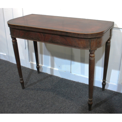 585 - A George III mahogany tea table, the hinged cross banded top with rounded front corners and inlaid w... 