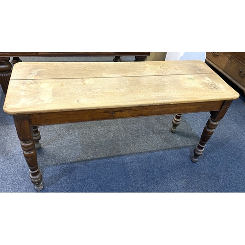 592 - A 19th century narrow rectangular side table with two plank top on turned baluster legs, 135cm by 50... 