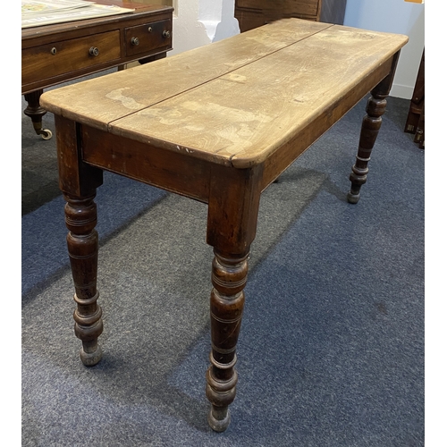 592 - A 19th century narrow rectangular side table with two plank top on turned baluster legs, 135cm by 50... 