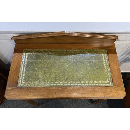 593 - A Victorian rectangular side table / desk with raised back and inset green tooled leather top, singl... 