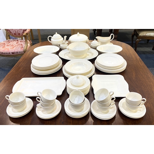 73 - A Wedgwood Queens Ware 'Edme Plain' part dinner and tea service comprising large oval dish, two open... 