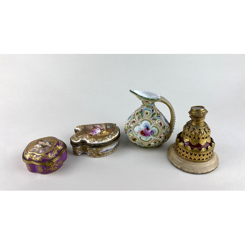 90 - A Continental gilt and enamelled snuff box, Frankenthal style mark to base, 7cm wide, a Sevres style... 