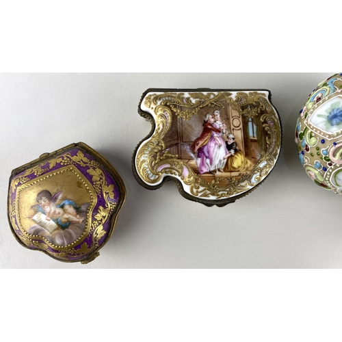 90 - A Continental gilt and enamelled snuff box, Frankenthal style mark to base, 7cm wide, a Sevres style... 