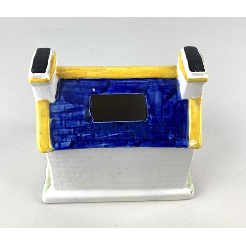 91 - A Prattware ceramic chapel money box, probably Mexborough, Yorkshire, modelled in the form of a chap... 