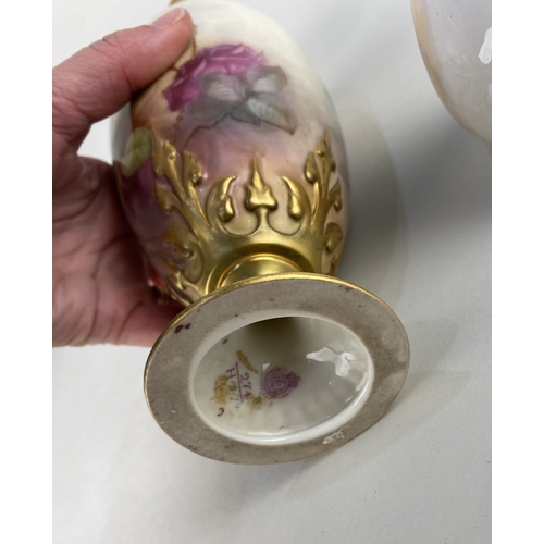 95 - A small Royal Worcester porcelain vase decorated with autumn fruits, signed Freemay, 7.5cm high, and... 