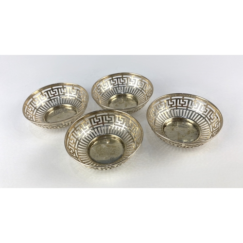 102 - A set of four George V silver dishes by E S Barnsley & Co (Edward Souter Barnsley), decorated wi... 