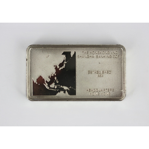 105 - A sterling silver ingot detailed the Hong Kong and Shanghai banking corporation weight 65g with a ca... 