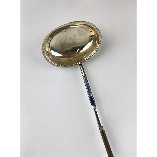 108 - A George III silver toddy ladle by Thomas Morley, with whalebone handle, London c.1780 (marks rubbed... 