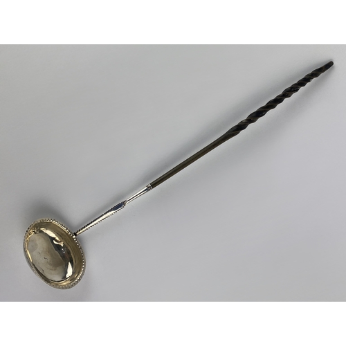 108 - A George III silver toddy ladle by Thomas Morley, with whalebone handle, London c.1780 (marks rubbed... 