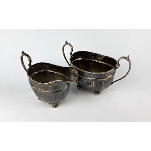 13 - A pair of George V silver twin handled milk jug and sugar bowl by S Blanckensee & Son Ltd, in a ... 