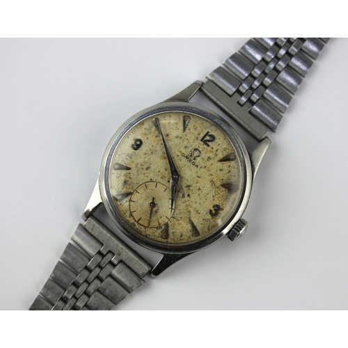 183 - An Omega steel circular case gentlemans wristwatch  the signed dial with silvered Arabic and arrow ... 