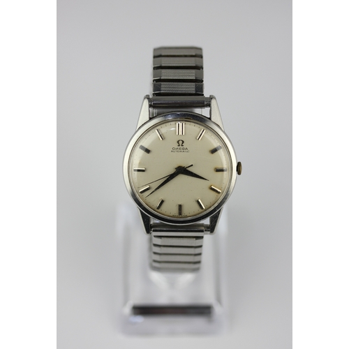 184 - An Omega automatic steel circular cased gentleman's wristwatch, the signed silvered dial with baton ... 