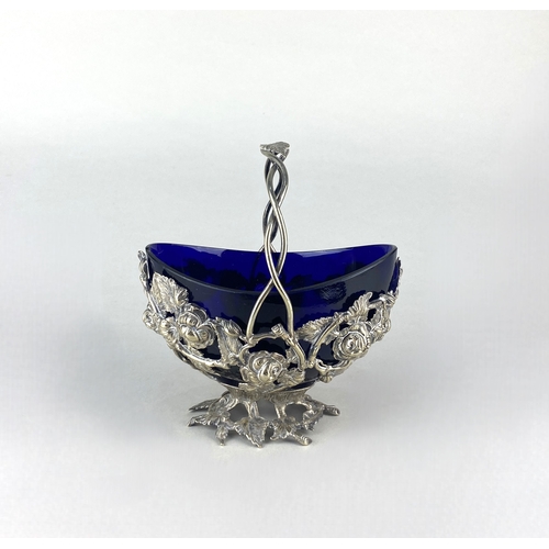 3 - A Victorian swing handled silver plated sugar basket, oval form, the pierced body decorated with ros... 