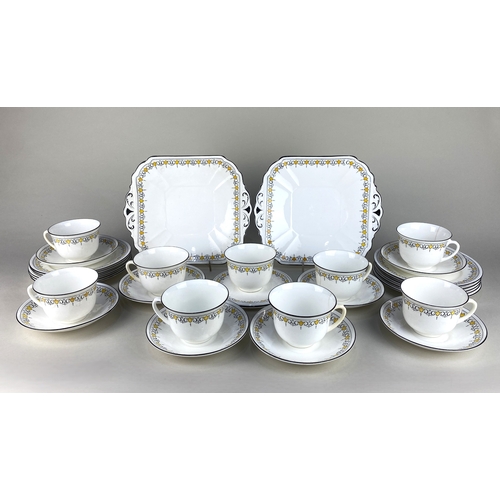 414 - A 1920's Shelley porcelain part tea set in the Bell pattern no. 11233, comprising two cake platters,... 