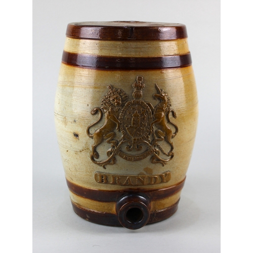 433 - A 19th century salt glazed stoneware Brandy barrel, decorated in relief with a Royal coat of arms an... 