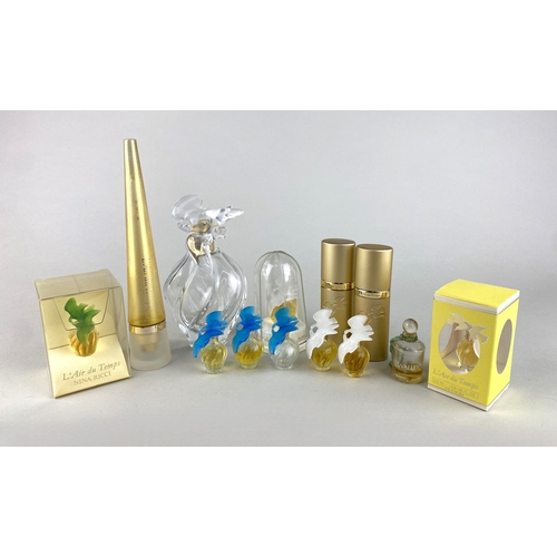 440 - A collection of Nina Ricci L'air du Temps perfume bottles and sprays to include eight miniature repl... 