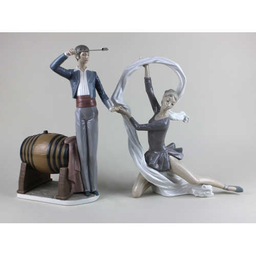 445 - A Lladro porcelain figure of a Spanish Wine Taster standing beside a barrel 37cm (a/f) and a Nao fig... 