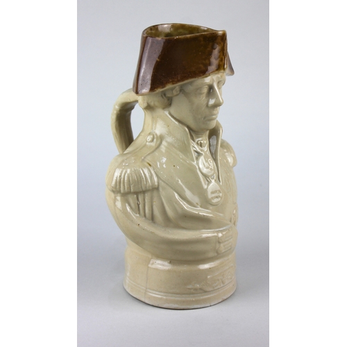 447 - A 19th century brown glazed ceramic portrait jug of Admiral Lord Nelson, 26cm high.... 