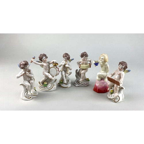 464 - Five Naples porcelain cherub musicians including an accordion player and a drummer (a/f) and a Royal... 