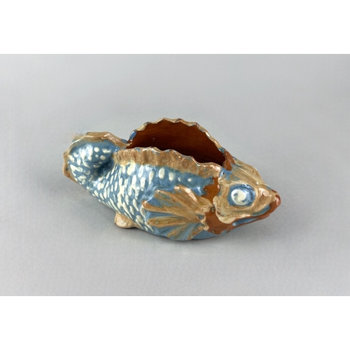 471 - A CH Brannam Barum art pottery vase in the form of a fish with brown, white and blue glaze, incised ... 