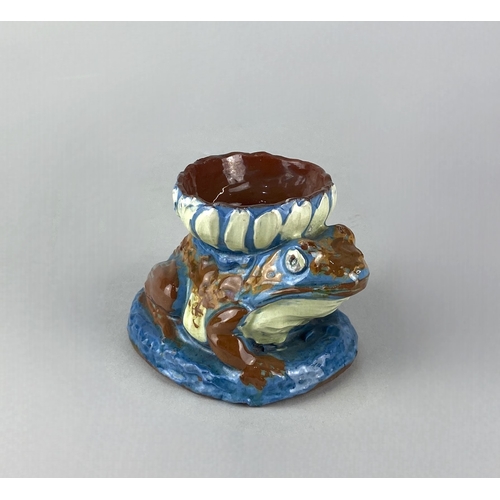 474 - A CH Brannam Barum pottery vase modelled as a frog, with brown, white and blue glaze, incised marks ... 