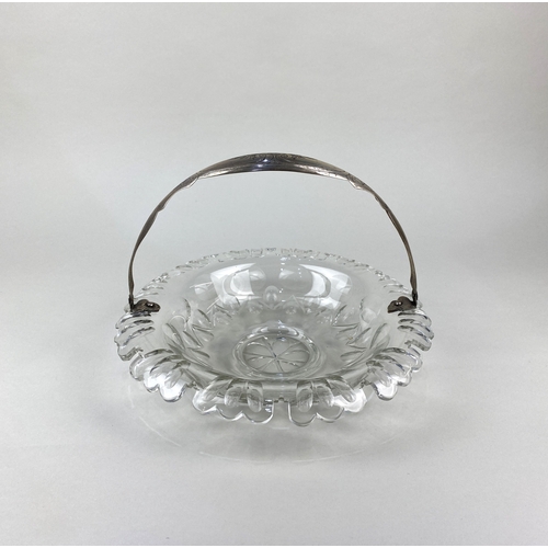 485 - A Dutch cut glass circular fruit bowl with engraved silver handle, silver hinge mounts and wavy bord... 