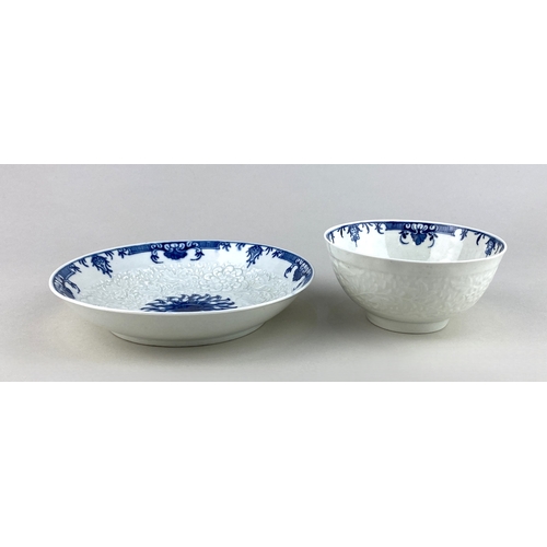 486 - An 18th century blue and white Worcester porcelain chrysanthemum pattern moulded teabowl and saucer,... 