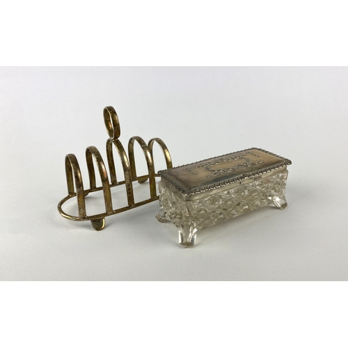 68 - A George V silver toast rack, maker Edwin Joseph Houlston. Birmingham 1945, together with a silver l... 