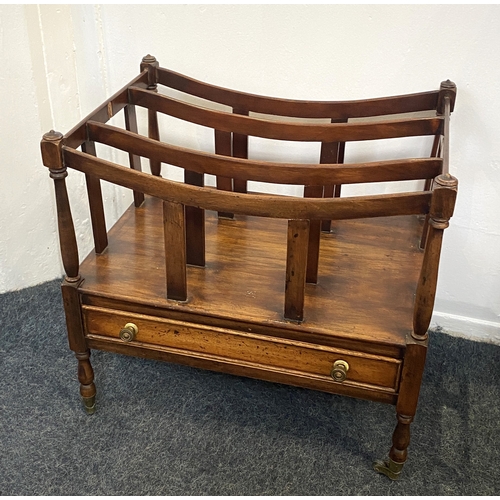 819 - A 19th century mahogany canterbury magazine rack with base drawer, on turned legs with castors, (a/f... 