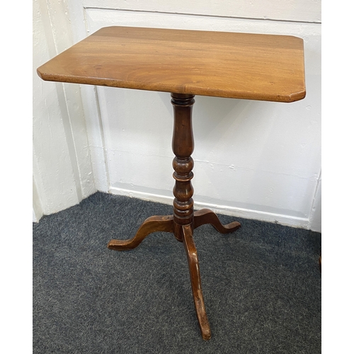 821 - A George III mahogany tilt topped rectangular cut corner side table on turned support and tripod bas... 