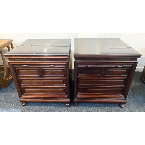 824 - A pair of heavy quality Chinese hardwood side tables / bedside cabinets, 20th century, each having t... 