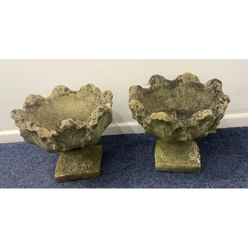 827 - A pair of reconstituted stone garden planters, of classical form, 32cm high by 37cm wide.... 