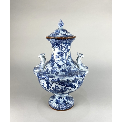 57 - A Royal Bonn blue and white ceramic two-handled vase and cover (a/f) 35cm... 