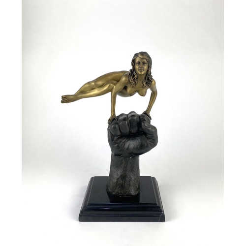 215 - A Juno bronze figure, of a posed nude female figure raised on a clenched hand, on marbled base, impr... 