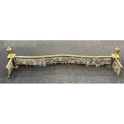 877 - A good 19th century brass fender, of neo classical form, serpentine fronted, pierced decoration and ... 
