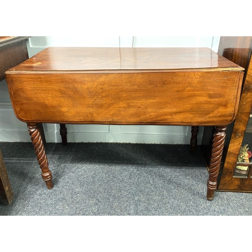 A 19th century mahogany occasional table having two drop flaps with ...