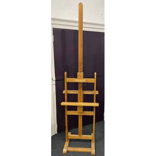 887 - An artist's double-sided easel with central wooden screw adjuster width 60cm... 