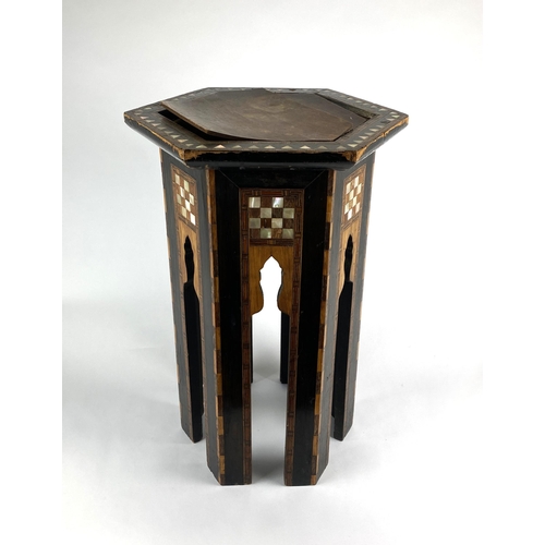 893 - A Middle Eastern coffee table, c.1900 / 1920, the octagonal multi wood construction with parquetry a... 